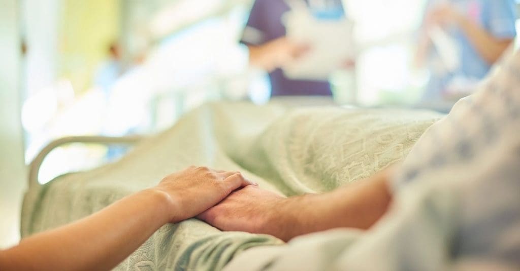 Patient in hospital bed